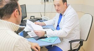 Man in consultation with a urologist